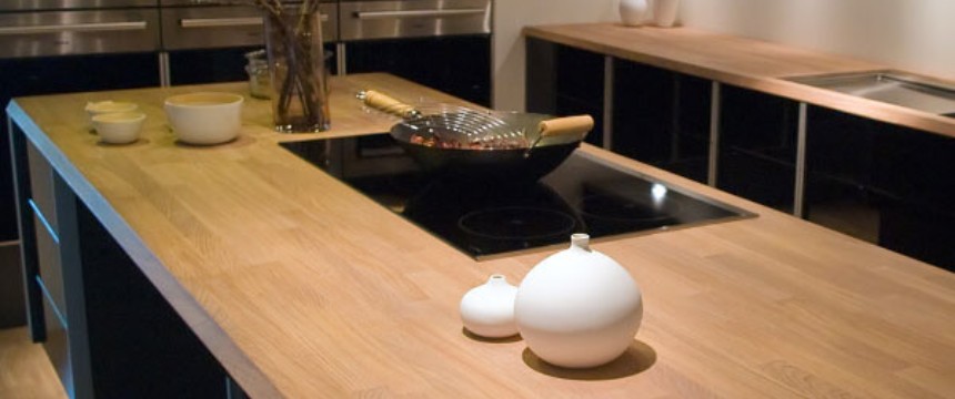 Solid wood kitchen worktops on an island and run of units